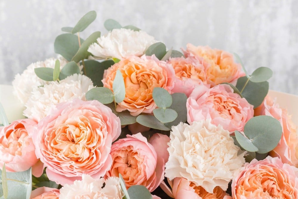 Summer bouquet including pink and orange carnation